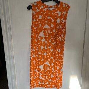 Never worn Diane von Furstenberg size 10 shift dress. Tangerine and white print